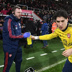 Arsenal's Hector Bellerin Shares Water with Physio Amid FA Cup Battle Against AFC Bournemouth