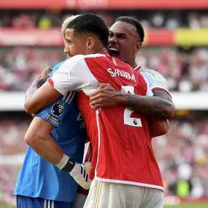 Arsenal's Historic Win: Magalhaes, Ramsdale, and Saliba Celebrate Over Manchester United in the 2023-24 Premier League