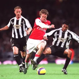 Arsenal's Hleb Faces Off Against Butt and Solano in 1:1 Battle at Emirates Stadium, FA Premiership, 18/11/06 Arsenal's Hleb Faces Off Against Butt and Solano in 1:1 Battle at Emirates Stadium, FA Premiership, 18/11/06