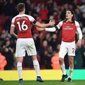 Arsenal's Holding and Bellerin: United in Defiance Against Liverpool