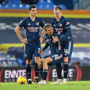 Arsenal's Holding and Ceballos Flanked by Xhaka during Leeds United Clash (2020-21)