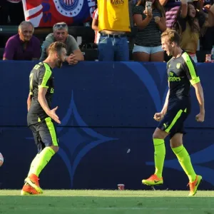 Arsenal's Holding and Chambers Celebrate Goal Against Chivas (2016-17)
