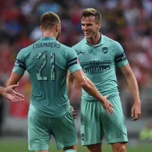 Arsenal's Holding and Chambers Celebrate Goal Against Paris Saint-Germain in 2018 International Champions Cup Arsenal's Holding and Chambers Celebrate Goal Against Paris Saint-Germain in 2018 International Champions Cup