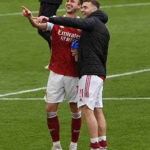 Arsenal's Holding and Chambers: Savoring Success Against Brighton in the 2020-21 Premier League Arsenal's Holding and Chambers: Savoring Success Against Brighton in the 2020-21 Premier League