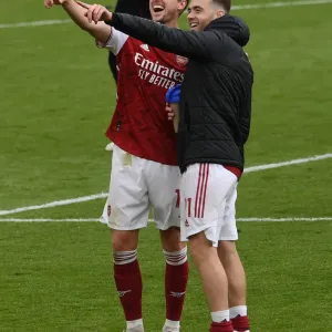 Arsenal's Holding and Chambers: Victory Celebration vs. Brighton & Hove Albion (2020-21) Arsenal's Holding and Chambers: Victory Celebration vs. Brighton & Hove Albion (2020-21)