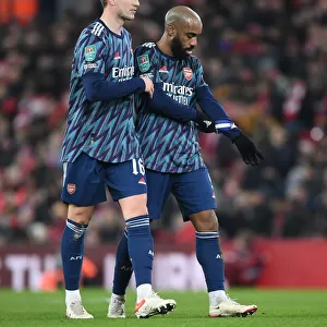 Arsenal's Holding and Lacazette Focused: Carabao Cup Battle at Anfield Against Liverpool