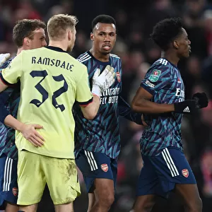 Arsenal's Holding, Ramsey, and Magalhaes at Liverpool's Anfield - Carabao Cup Semi-Final First Leg