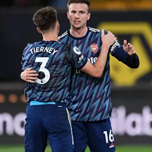 Arsenal's Holding and Tierney Celebrate Victory Over Wolverhampton Wanderers in Premier League