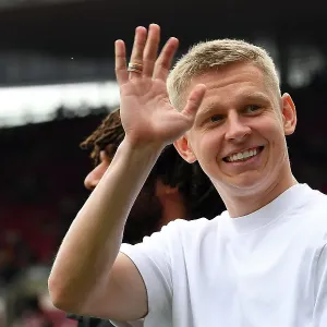 Arsenal's Injured Zinchenko Bids Farewell to Fans vs. Brighton & Hove Albion (2022-23)