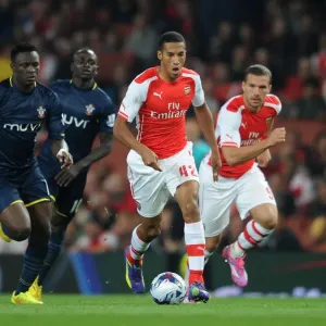 Arsenal's Isaac Hayden Outmaneuvers Victor Wanyama in Capital One Cup Clash Arsenal's Isaac Hayden Outmaneuvers Victor Wanyama in Capital One Cup Clash