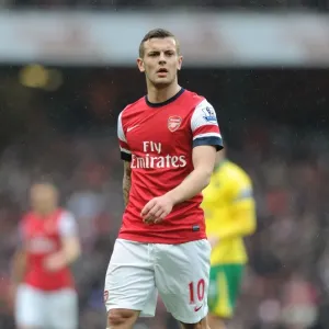 Arsenal's Jack Wilshere in Action against Norwich City (2012-13) Arsenal's Jack Wilshere in Action against Norwich City (2012-13)