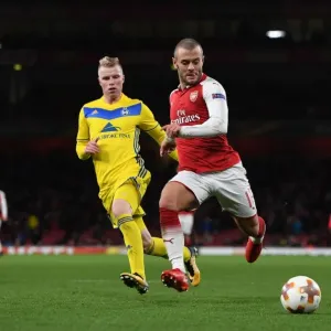 Arsenal's Jack Wilshere Clashes with BATE Borisov's Evgeni Berezkin in Europa League Showdown