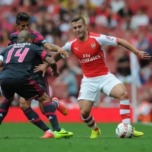 Arsenal's Jack Wilshere Clashes with Benfica's Maxi Pereira in Emirates Cup Showdown Arsenal's Jack Wilshere Clashes with Benfica's Maxi Pereira in Emirates Cup Showdown