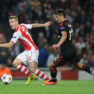 Arsenal's Jack Wilshere Clashes with Besiktas Mustafa Pektemek in UEFA Champions League Qualifier