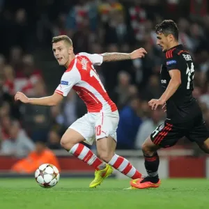 Arsenal's Jack Wilshere Clashes with Besiktas Mustafa Pektemek in UEFA Champions League Qualifier