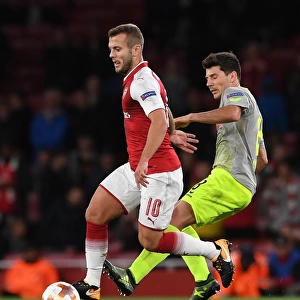 Arsenal's Jack Wilshere Clashes with FC Köln's Milos Jojic in Europa League Showdown