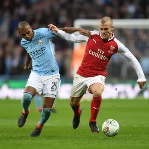 Arsenal's Jack Wilshere Clashes with Manchester City's Fernandinho in Carabao Cup Final Showdown Arsenal's Jack Wilshere Clashes with Manchester City's Fernandinho in Carabao Cup Final Showdown