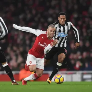 Arsenal's Jack Wilshere Clashes with Newcastle's Isaac Hayden in Premier League Showdown