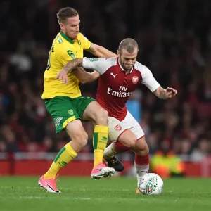 Arsenal's Jack Wilshere Clashes with Norwich's Marco Stiepermann in Carabao Cup Showdown Arsenal's Jack Wilshere Clashes with Norwich's Marco Stiepermann in Carabao Cup Showdown