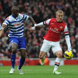 Arsenal's Jack Wilshere Clashes with QPR's Samba Diakite in Premier League Showdown