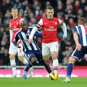 Arsenal's Jack Wilshere Clashes with Youssouf Mulumbu and James Morrison of West Bromwich Albion, Premier League 2012-13