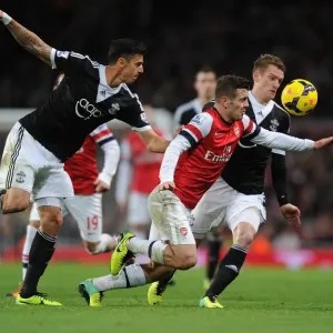 Arsenal's Jack Wilshere Drives Past Southampton's Defense in 2013-14 Premier League Clash