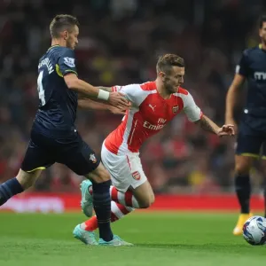 Arsenal's Jack Wilshere Faces Off Against Southampton's Morgan Schneiderlen in League Cup Clash Arsenal's Jack Wilshere Faces Off Against Southampton's Morgan Schneiderlen in League Cup Clash
