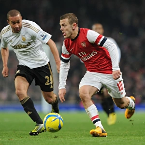Arsenal's Jack Wilshere Faces Off Against Swansea's Ashley Richards in FA Cup Third Round Replay