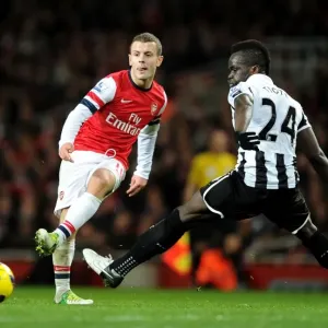 Arsenal's Jack Wilshere Fends Off Newcastle's Cheick Tiote: A Battle in the Midfield, December 2012