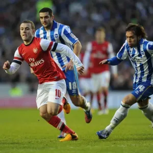 Arsenal's Jack Wilshere Goes Head-to-Head with Brighton's Gary Dicker and Inigo Calderon in FA Cup Showdown