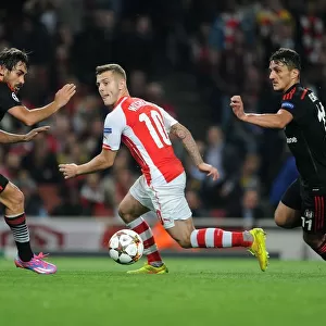 Arsenal's Jack Wilshere Goes Head-to-Head with Mustafa Pektemek and Ersan Gulum in Intense UEFA Champions League Showdown