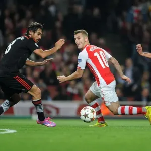 Arsenal's Jack Wilshere Goes Head-to-Head with Mustafa Pektemek and Ersan Gulum in Intense UEFA Champions League Showdown