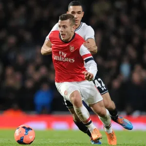 Arsenal's Jack Wilshere Outmaneuvers Tottenham's Nabil Bentaleb in FA Cup Clash Arsenal's Jack Wilshere Outmaneuvers Tottenham's Nabil Bentaleb in FA Cup Clash