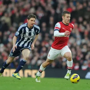 Arsenal's Jack Wilshere Outmaneuvers West Brom's Zoltan Gera during the 2012-13 Premier League Match