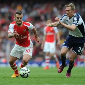 Arsenal's Jack Wilshere Outsmarts Darren Fletcher: A Moment of Skill in the 2014/15 Premier League Clash Arsenal's Jack Wilshere Outsmarts Darren Fletcher: A Moment of Skill in the 2014/15 Premier League Clash