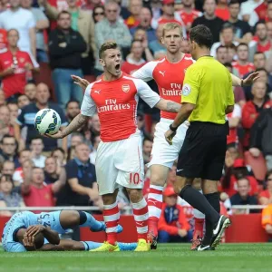 Arsenal's Jack Wilshere Protests to Referee during Arsenal vs Manchester City (2014-15)