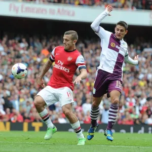 Arsenal's Jack Wilshere Surges Past Aston Villa's Ashley Westwood in 2013-14 Premier League Clash