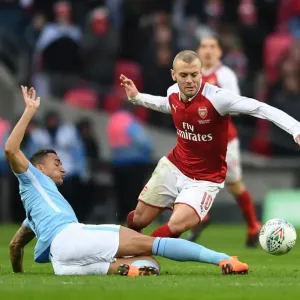 Arsenal's Jack Wilshere Tackled by Manchester City's Danilo in Carabao Cup Final Showdown Arsenal's Jack Wilshere Tackled by Manchester City's Danilo in Carabao Cup Final Showdown
