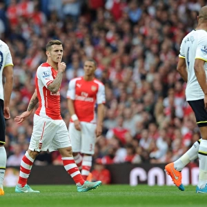 Arsenal's Jack Wilshere and Tottenham's Younes Kaboul Lock Eyes During Intense Rivalry