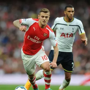 Arsenal's Jack Wilshere vs. Tottenham's Etienne Capoue: A Midfield Showdown in the 2014-15 Premier League Clash