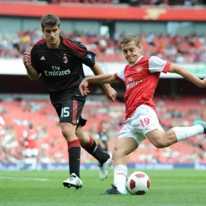 Arsenal's Jack Wilshere vs AC Milan's Sokratis Papastathopoulos - Emirates Cup Showdown Arsenal's Jack Wilshere vs AC Milan's Sokratis Papastathopoulos - Emirates Cup Showdown