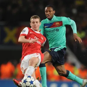 Arsenal's Jack Wilshere vs Barcelona's Seydou Keita: A Battle at Emirates Stadium in the UEFA Champions League (2011)