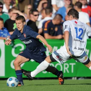 Arsenal's Jack Wilshere vs. SC Columbia's Alexander Frimmel: A Pre-Season Clash in Vienna, 2009