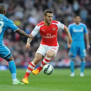 Arsenal's Jack Wilshere vs. Sunderland's Jermain Defoe: Intense Face-Off in Premier League Showdown, May 2015 Arsenal's Jack Wilshere vs. Sunderland's Jermain Defoe: Intense Face-Off in Premier League Showdown, May 2015