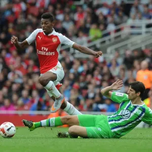Arsenal's Jeff Reine-Adelaide Outsmarts Timm Klose: A Moment of Skill at the Emirates Cup, 2015