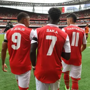 Arsenal's Jesus, Saka, and Martinelli in Action: Arsenal vs Sevilla, Emirates Cup 2022 Arsenal's Jesus, Saka, and Martinelli in Action: Arsenal vs Sevilla, Emirates Cup 2022