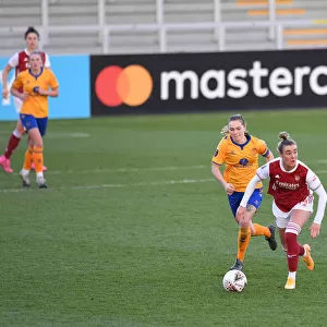 Arsenal's Jill Roord Battles Everton Defenders in FA WSL Clash at Meadow Park (2020-21)