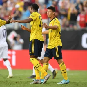 Arsenal's Joe Willock and Alexandre Lacazette Celebrate Goal in 3-0 International Champions Cup Win