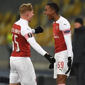 Arsenal's Joe Willock and Emile Smith Rowe: Celebrating Goals in Europa League Victory over Vorskla Poltava