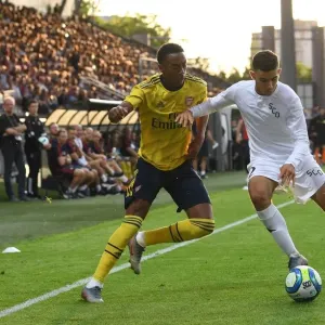Joe Willock Faces Off Against Rachid Alioui Print